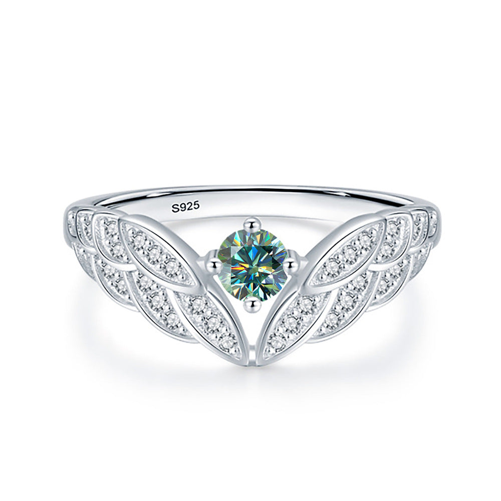 Wings of Serenity – A Blue-Green Moissanite Ring of Heavenly Grace